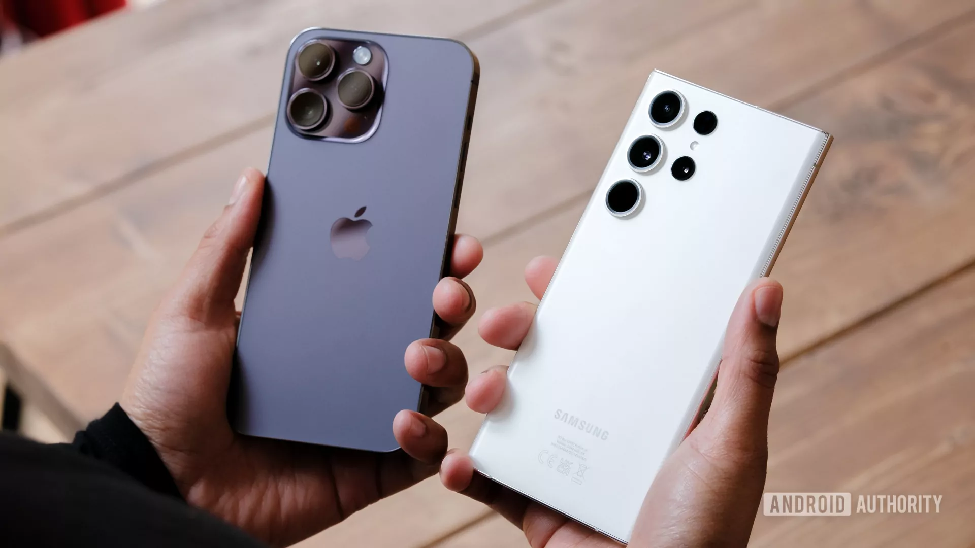 Apple-iPhone-14-Pro-Max-vs-Samsung-Galaxy-S23-Ultra-in-hand-undecided.jpg