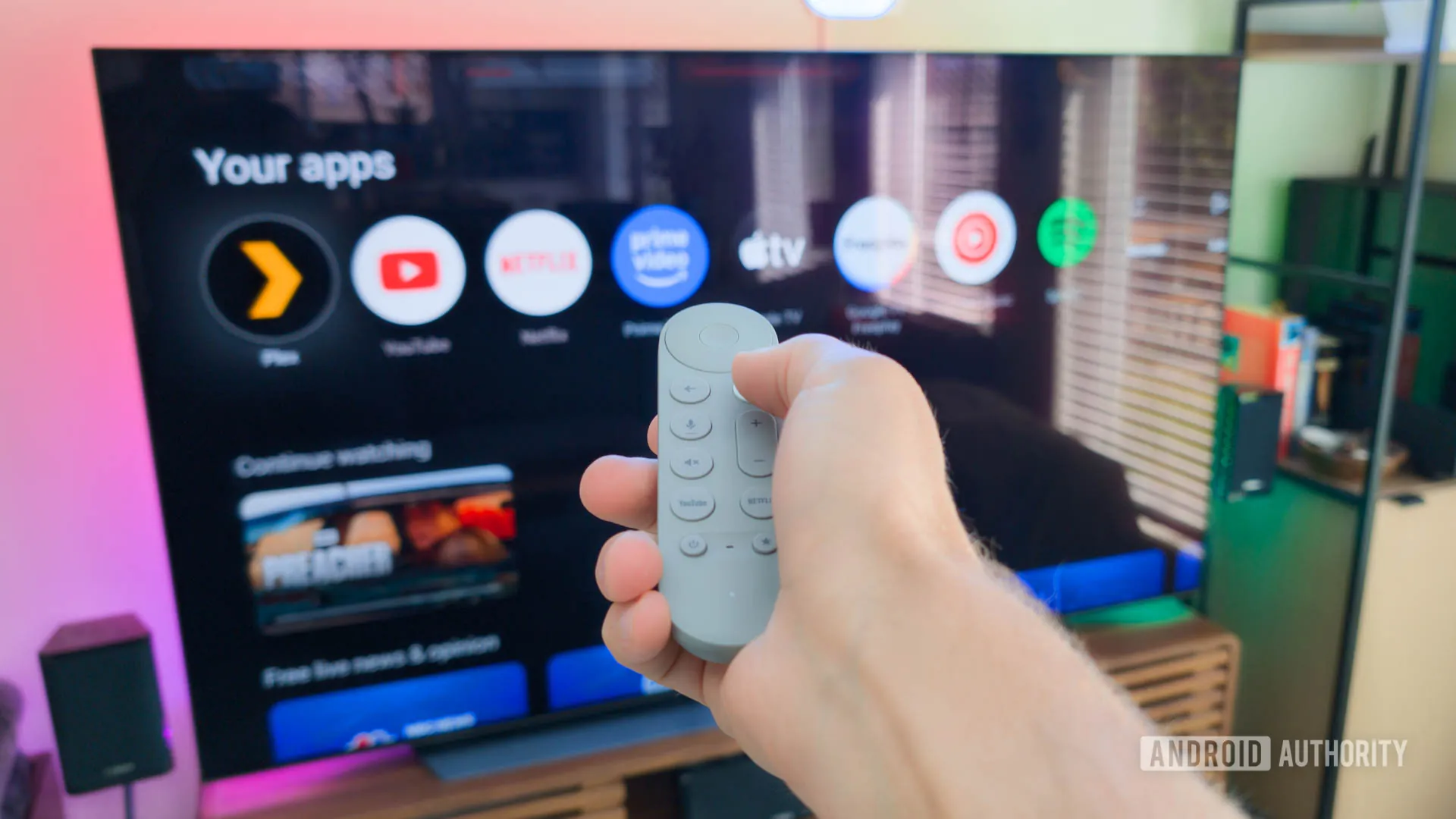 Google-TV-Streamer-remote-in-hand-controlling-TV.jpg